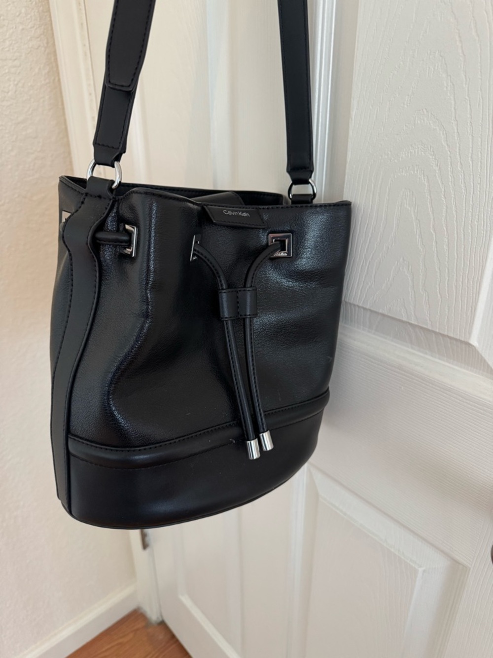 Calvin Klein Ash Drawstring Bucket Crossbody Bag in Black with Silver Hardware - Picture 5 of 13